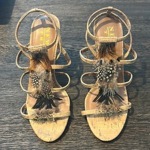 New York Transit 3 inch heel shoe. Feather detail front. Size 6M. Tan color.